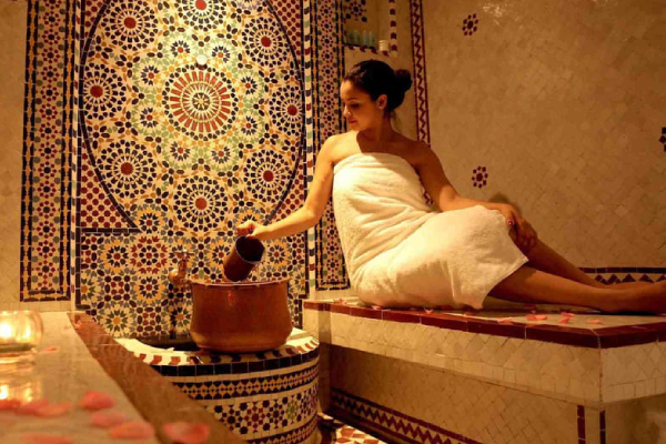 Woman relaxing in traditional Moroccan Hammam Sydney spa setting